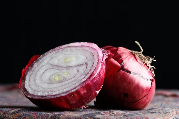 Elegant red onion on black background — Stock Image Elegant red onion on black background Stock Picture