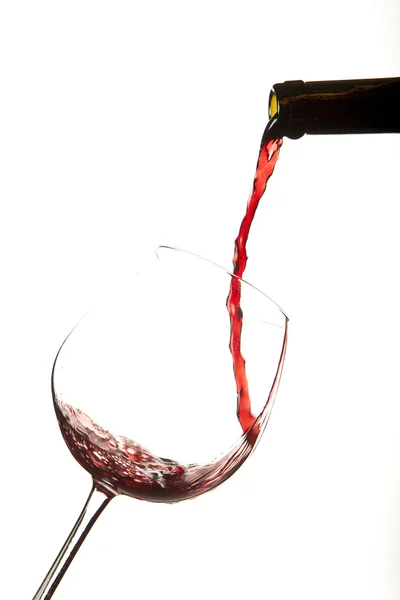 ガラス、白い背景に赤のワインのスプラッシュ. — ストック写真