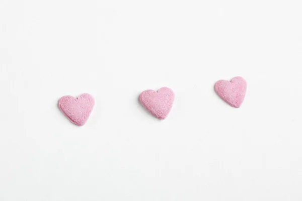Heart shaped candy sweets on white background — Stock Photo, Image