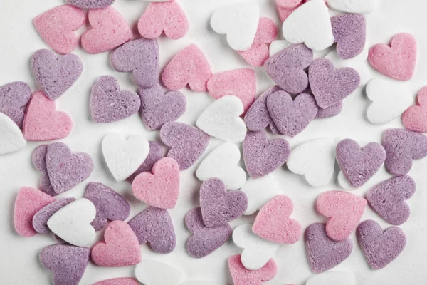 Heart shaped candy sweets on white background — Stock Photo, Image