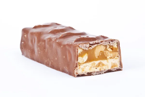 Primer plano de la barra de chocolate aislado en blanco — Foto de Stock