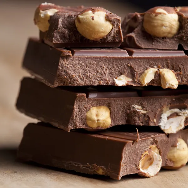 Chocolate with hazelnuts — Stock Photo, Image