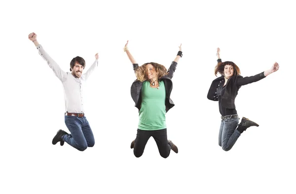 Three happy young jumping Stock Picture