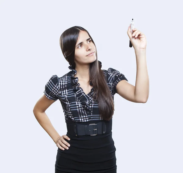 Happy smiling cheerful young business woman writing or drawing on screen with a marker, isolated on white background — Stock Photo, Image