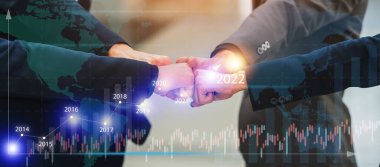 Close-up of stack hand of Businessman handshake for teamwork of business merger finance investment partnership and business deal