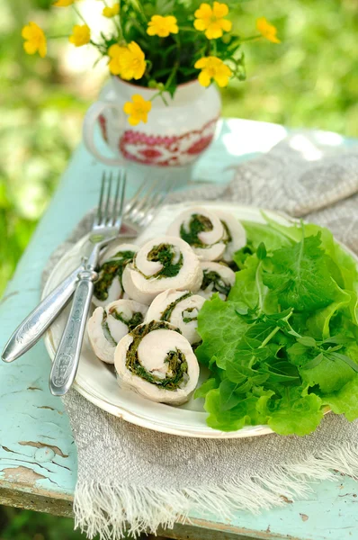 Chicken fillet rolls with fresh greens served with salad leaves, copy space for your text — Stock Photo, Image