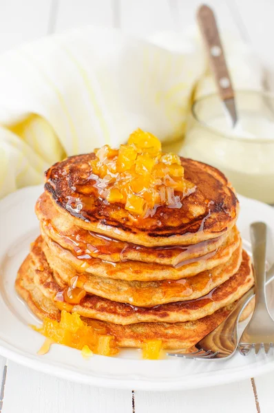 A Stack of Pumpkin Pancakes Topped with Pumpkin-in-Syrup Preserves, copy space for your text — Stock Photo, Image