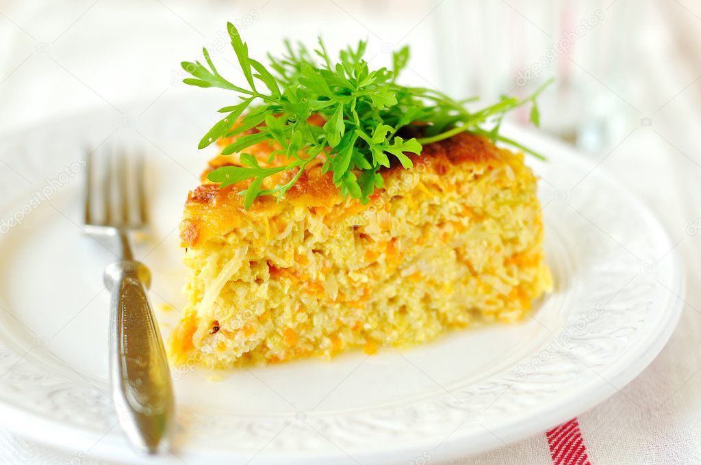A Slice of Zucchini and Carrot Bake with Rocket, shallow depth of field