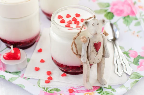A Jar of Yoghurt with Raspberry Jam and a Teddy Bear Toy Leaning — Stock Photo, Image