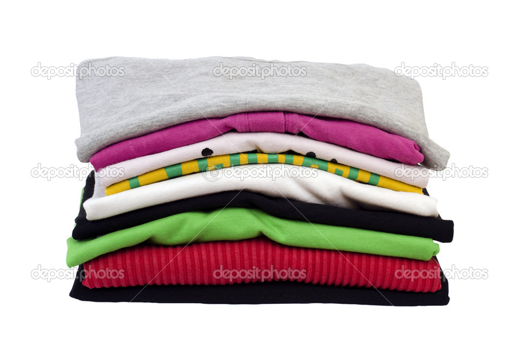 Folded clothes isolated on white
