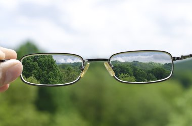 seeing nature through the glasses clipart