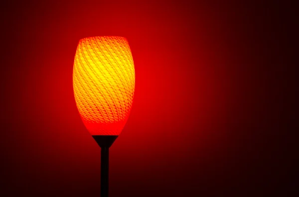 Lamp shining red and orange color light — Stock Photo, Image