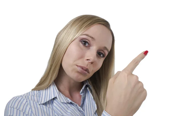 Woman pointing with her finger on white background — Stock Photo, Image
