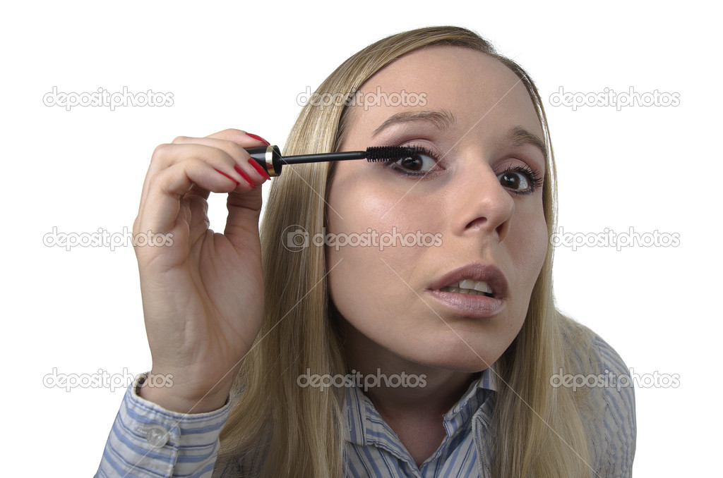 Woman applying a mascara
