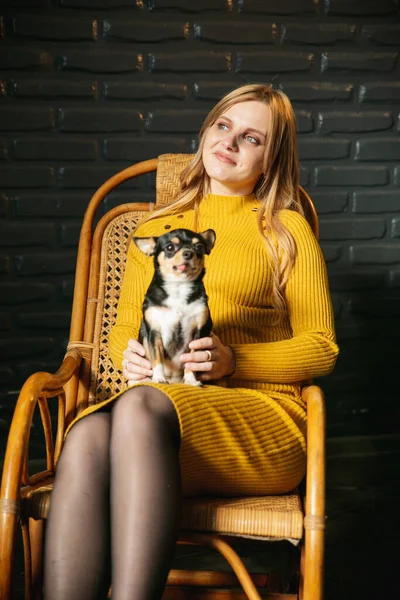 Pregnant Woman Yellow Dress Sitting Dog Rocking Chair — Zdjęcie stockowe