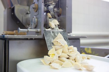 Production of dumplings with potato filling Traditional Russian cuisine, bakery products,