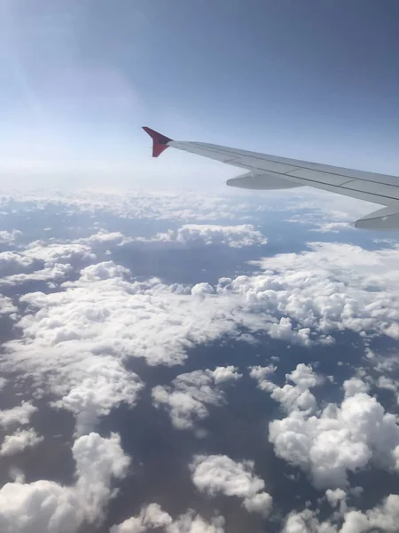 flight and travel, view of the wing from the window of the aircraft