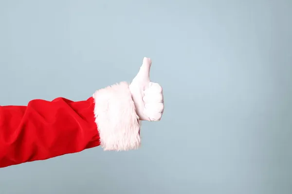 Mão Papai Noel Mostrando Fundo Azul — Fotografia de Stock