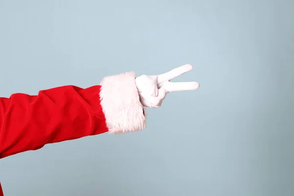 Mano Babbo Natale Che Mostra Sullo Sfondo Blu — Foto Stock