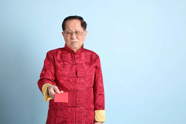 Senior Asian Man Wearing Traditional Chinese Shirt Blue Background — 图库照片