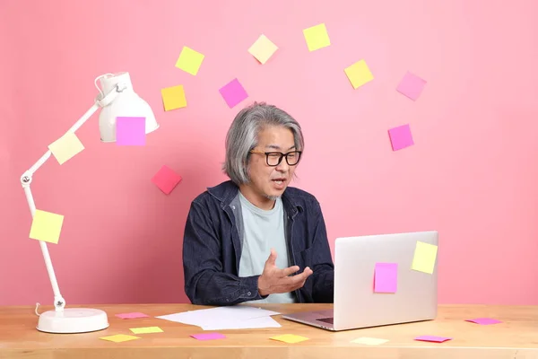 Senior Asian Man Sitting Working Desk Lot Paper Work Pink — Photo