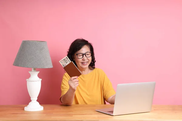 Senior Asian Woman Working Laptop Sitting Desk Pink Background — Photo