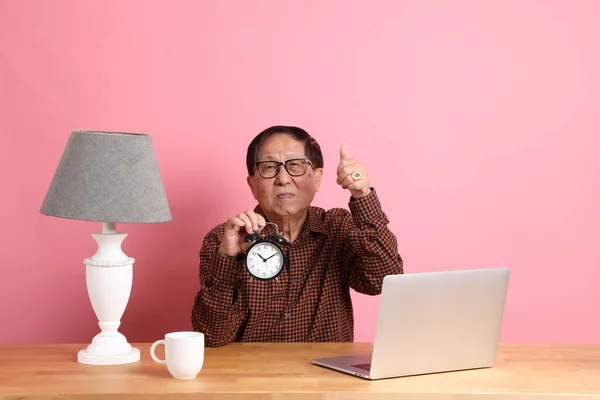 Senior Asian Man Sitting Working Desk Laptop Pink Background — Stockfoto