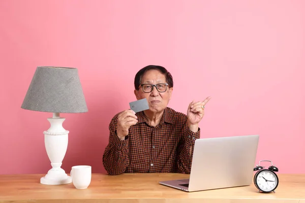 Senior Asian Man Sitting Working Desk Laptop Pink Background — Foto Stock