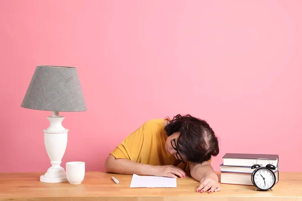 Senior Asian Woman Reading Book Sitting Desk Pink Background — Fotografia de Stock