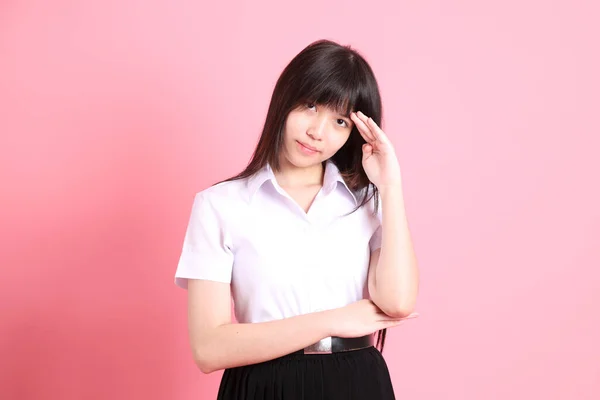 Menina Asiática Adolescente Com Uniforme Universitário Fundo Rosa — Fotografia de Stock