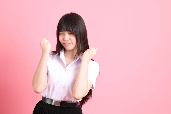 Üniversite Üniformalı Genç Asyalı Kız Pembe Arka Planda Duruyor — Stok fotoğraf