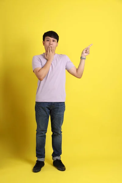 Young Adult Asian Man Standing Yellow Background — Stock Photo, Image