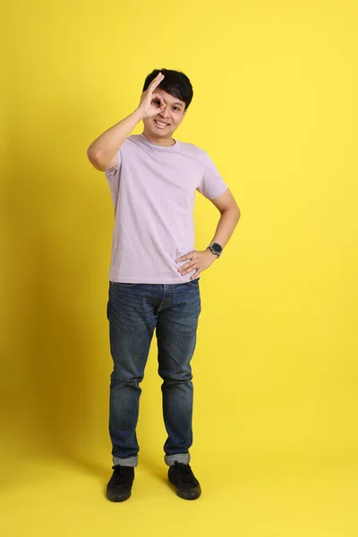 Young Adult Asian Man Standing Yellow Background — Stock Photo, Image