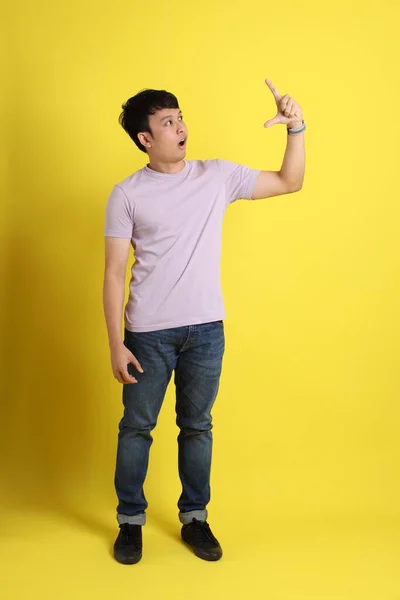 Young Adult Asian Man Standing Yellow Background — Stock Photo, Image