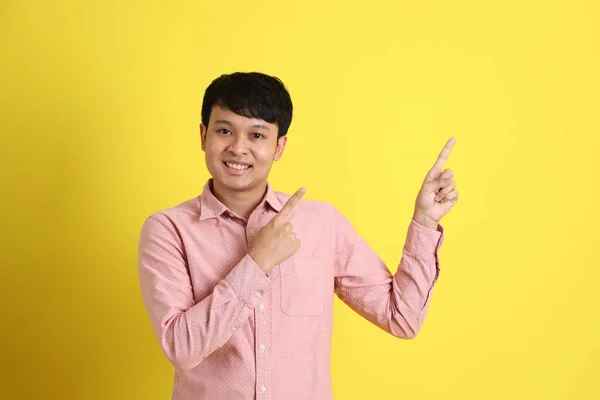 Asian Man Pink Shirt Standing Yellow Background — Stock Photo, Image