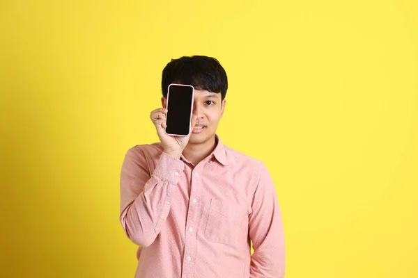 Young Adult Asian Man Standing Yellow Background — Stock Photo, Image