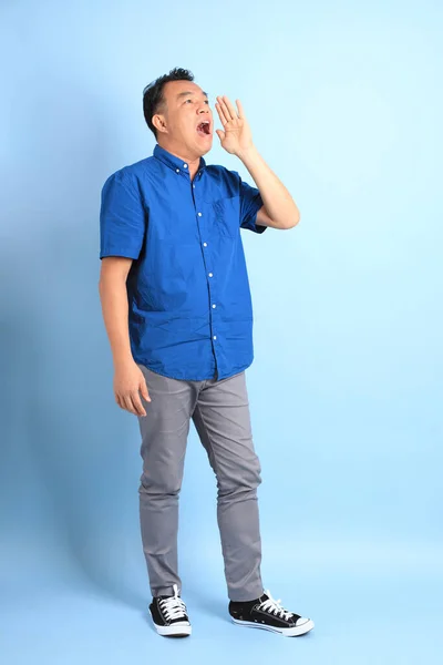 Asian Middle Aged Man Blue Shirt Standing Blue Background — Stock Photo, Image