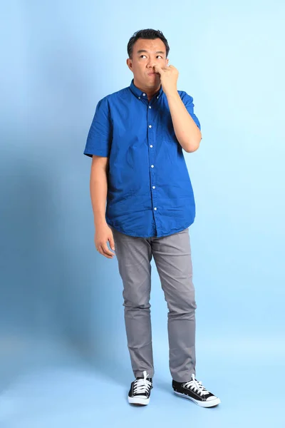Asian Middle Aged Man Blue Shirt Standing Blue Background — Stock Photo, Image