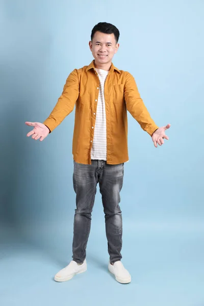 Asian Lgbtq Man Yellow Shirt Standing Blue Background — 스톡 사진