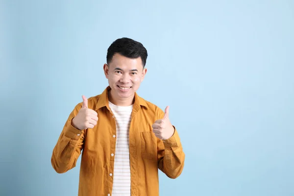 Asian Lgbtq Man Yellow Shirt Standing Blue Background — 스톡 사진