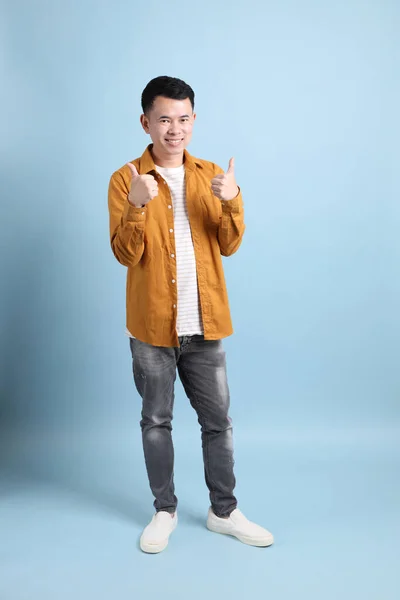 Asian Lgbtq Man Yellow Shirt Standing Blue Background — 图库照片