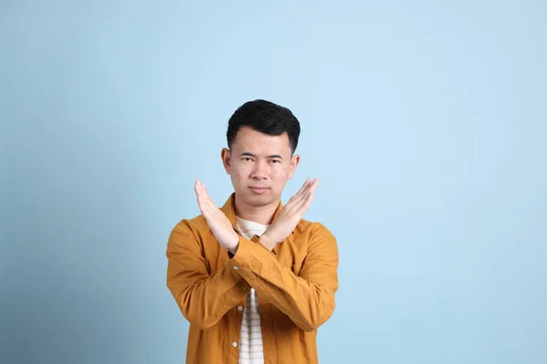 Asian Lgbtq Man Yellow Shirt Standing Blue Background — ストック写真