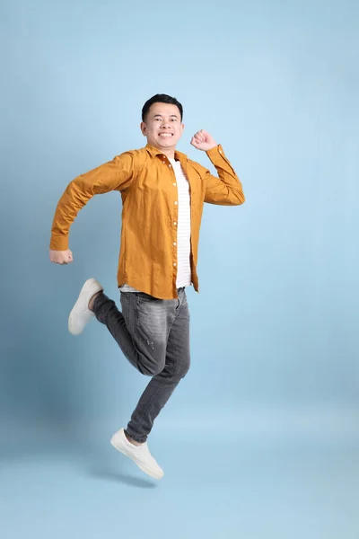 Asian Lgbtq Man Yellow Shirt Standing Blue Background — Foto de Stock