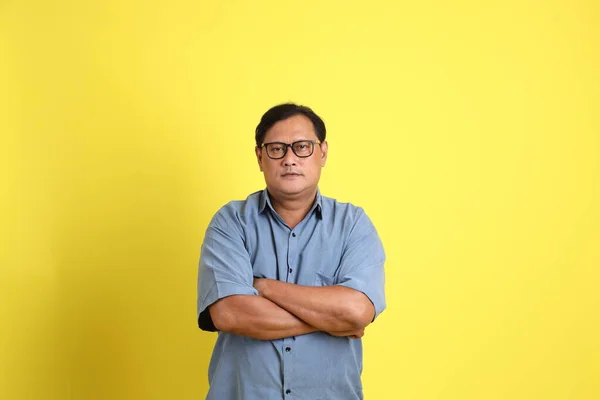 Adult Asian Man Blue Shirt Standing Yellow Background — Foto Stock
