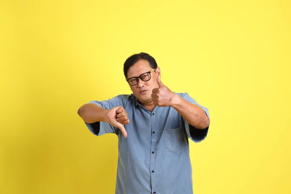 Adult Asian Man Blue Shirt Standing Yellow Background — Stok fotoğraf