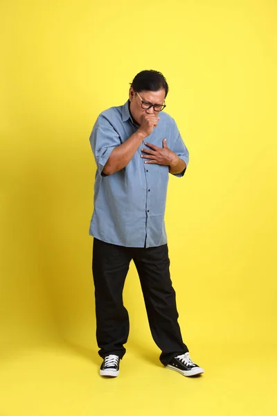 Adult Asian Man Blue Shirt Standing Yellow Background — 图库照片