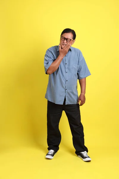 Adult Asian Man Blue Shirt Standing Yellow Background — 스톡 사진