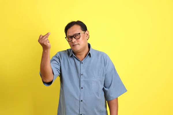 Adult Asian Man Blue Shirt Standing Yellow Background — Stok fotoğraf