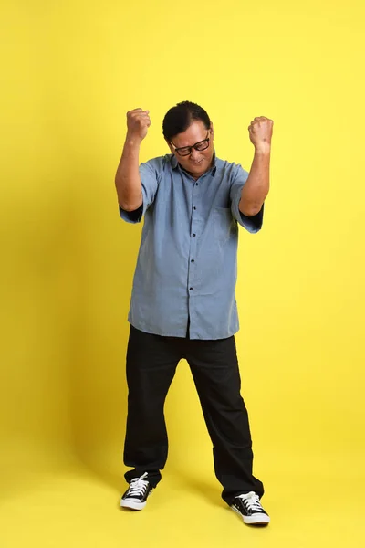 Adult Asian Man Blue Shirt Standing Yellow Background — Fotografia de Stock