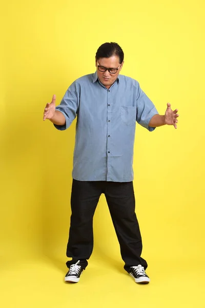 Adult Asian Man Blue Shirt Standing Yellow Background — Fotografia de Stock